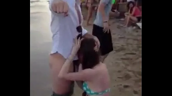Paying blowjob on the beach