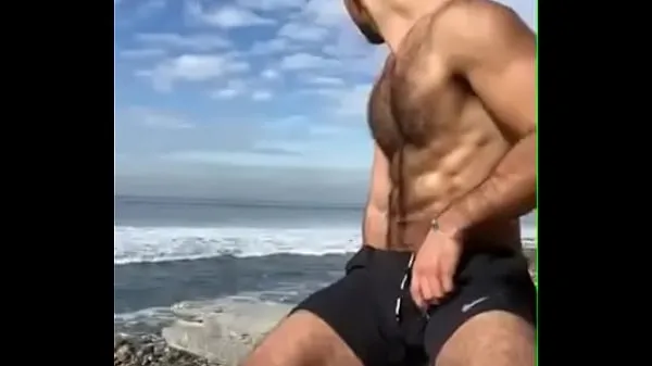 Watch Male jerks off outdoors warm Videos