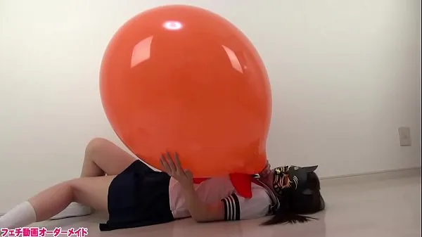 Katso Balloon popping lämmintä videota