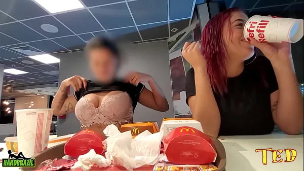ดู Two naughty girls making out with their breasts out while eating at McDonald's - Official Tattooed Angel วิดีโอที่อบอุ่น